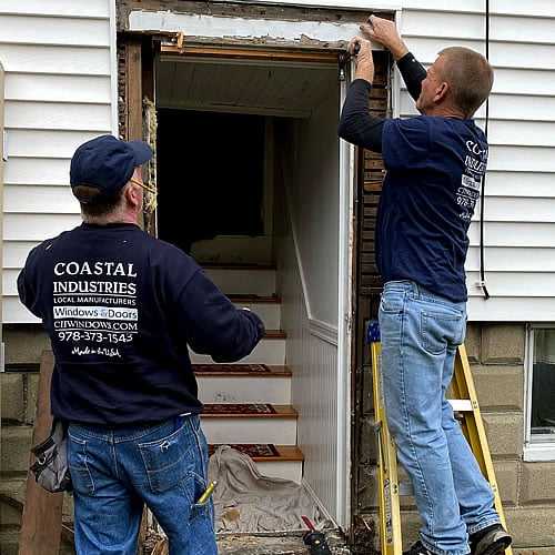 Technical specialist preparing exterior entrance system